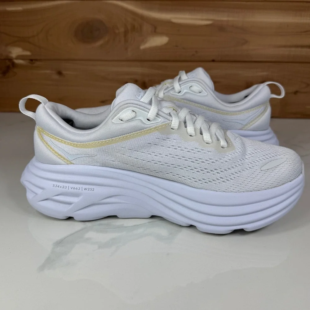 Hoka One One White Athletic Running Shoes with Subtle Gold Trim